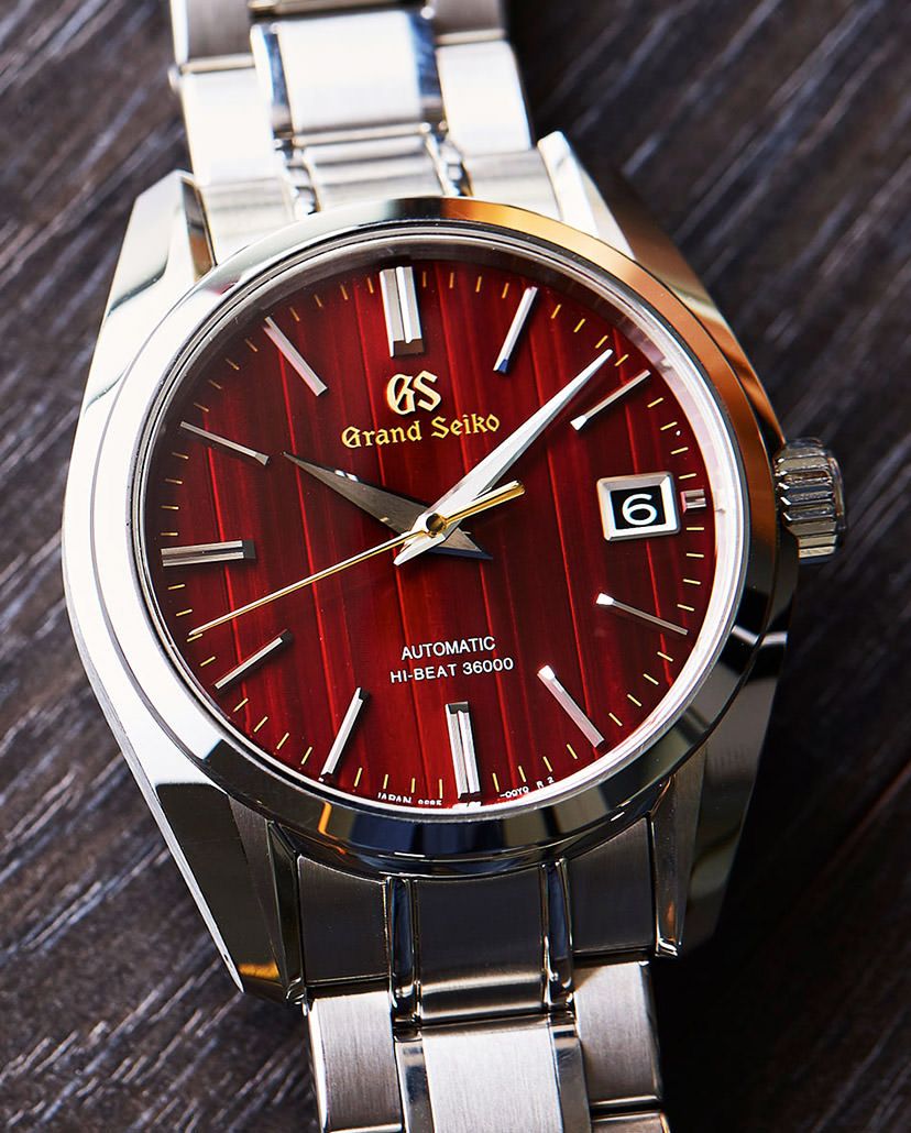 red dial watch