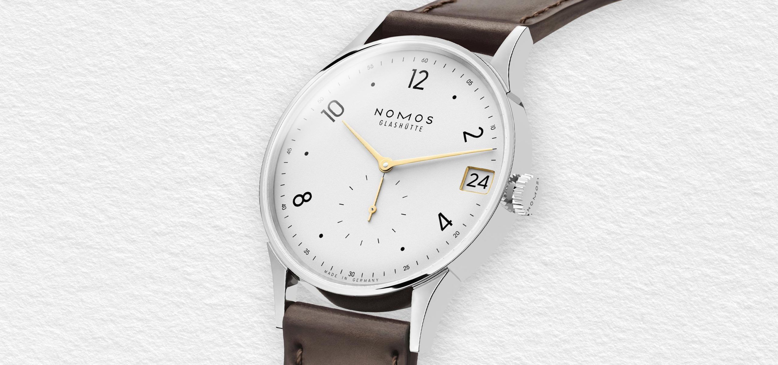 Glints Of Gold And Rhodium: The New Nomos Minimatik Date 39 Trio
